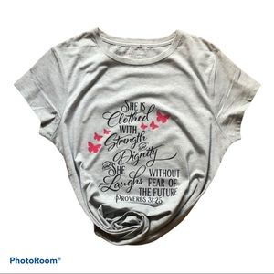 She’s clothed by strength TEE